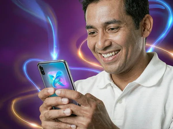999JILI adult using a smartphone with a colourful screen