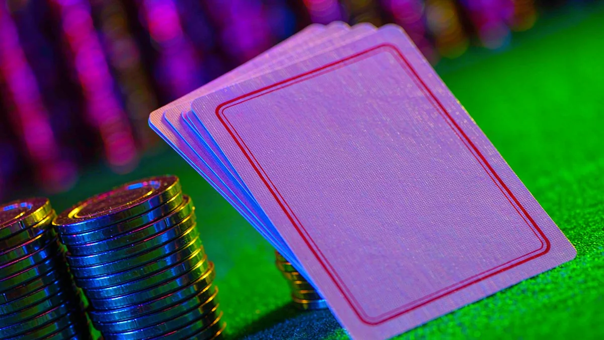 999JILI face-down playing cards beside casino chips
